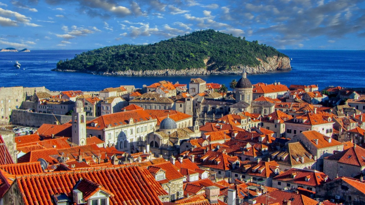 Aerial view of Dubrovnik old town walls and harbor on the Adriatic Sea, Dalmatia, Croatia