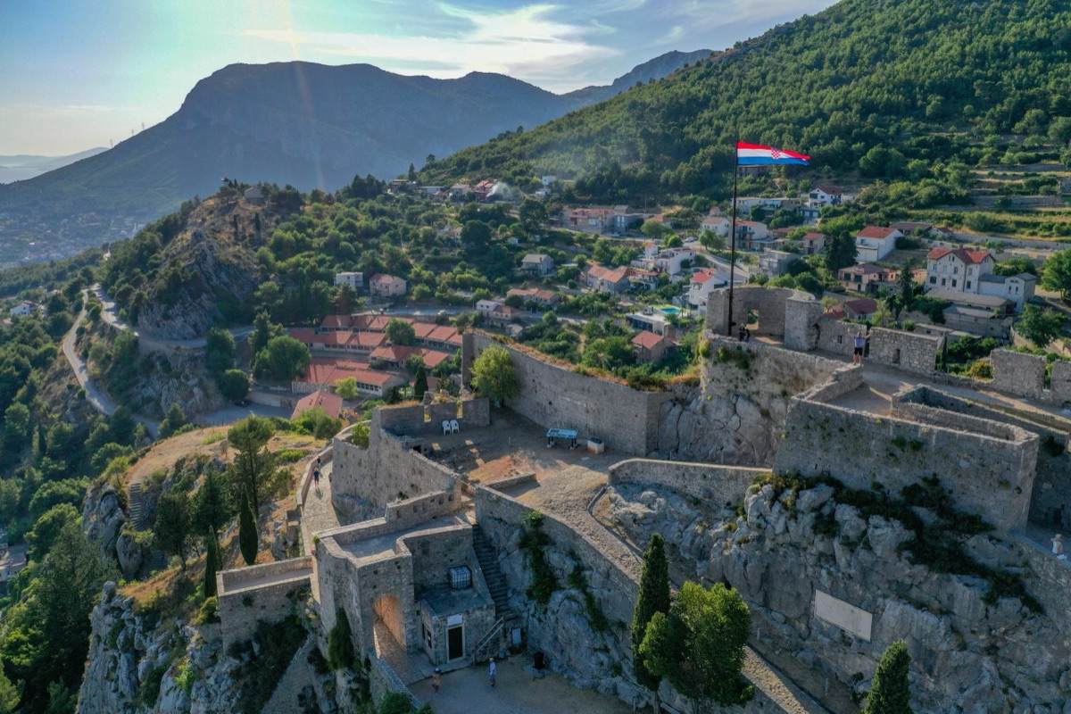 Klis Fortress on a rocky hill above Split with panoramic views over Dalmatia and the Adriatic, Croatia